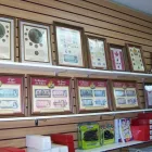 Entreprises 4 image MONNAIE UNIGRADE ENR Stamp & Coin Dealers dans Boucherville QC